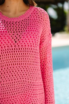 This crochet cover up is so cute! We love the color and the simple style. That shift fit is so easy! This is the perfect cover up for going from the beach straight into a beachside restaurant. Round neckline Long sleeves with drop shoulders Crochet fabric Fair stretch Savannah is wearing the small. Pink Crochet Top For Beach, Spring Poolside Crochet Top, Pink Crochet Top With Crochet Trim For Beach, Summer Crochet Cover-up With Long Sleeves, Summer Long Sleeve Crochet Cover-up, Pink Crochet Top For Beach Vacation, Pink Open Knit Crochet Top For Beach, Pink Open Knit Crochet Top For The Beach, Pink Crochet Top For Beach Season