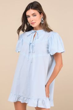 Sweet, whimsical vibes are sure to follow wherever you go in the Sister Jane Darling Drawstring Blue Puff Sleeve Shift Mini Dress! Lightweight woven fabric shapes short puff sleeves (with elastic at the cuffs) that frame a cute, shift-style silhouette that boasts a crew neckline with a dainty tie, a keyhole cutout, and a functional drawstring detail across the bodice. Angled seaming accents the relaxed silhouette, which ends at a ruffled mini hem. Hidden zipper at back. Fit: This garment fits tr Mini Shift Dress, Full Skirt, Puff Sleeve, Bodice, Casual Dresses, Dress Outfits, Mini Dress, Dresses, Blue