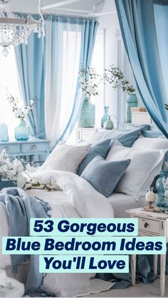 a bedroom with blue drapes and white bedding in the corner, surrounded by flowers