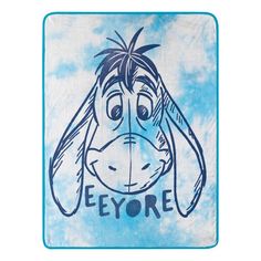 the eeyore character is drawn on a blue and white towel