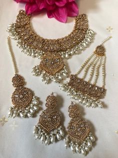 Beautiful elegant nauratan necklace set with white Pearl beads. Set includes necklace, earrings, tikka and jhumar. Wedding Jewellery, Wedding Jewelry Sets, White Pearl, Necklace Earrings, Pearl Beads, Pearl White, Antique Gold, Necklace Set, Jewelry Sets