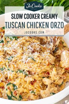 slow cooker creamy tuscann chicken orzo in a white bowl with spoons