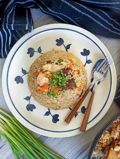 a plate with rice and vegetables on it