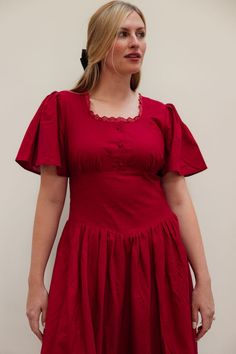 PRE-ORDER - AVAILABLE FALL 2024 This is the red linen dress you need in order to feel like the fairest milkmaid in the village (everyone's secret goal). A gorgeous vintage-inspired dress. Enjoy linen fabric's natural feel and fall with a lace-up back for generous, customizable sizing.  All Poet dresses come with a poem Red Puff Sleeve Dress For Garden Party, Cottagecore Square Neck Dress With Ruffle Hem, Peasant Style Square Neck Day Dresses, Cottagecore Prairie Dress For Gatherings, Peasant Style Square Neck Dress For Daywear, Peasant Dress With Square Neck For Daywear, Red Square Neck Dress For Garden Party, Fitted Cottagecore Prairie Dress For Gatherings, Cottagecore Fitted Prairie Dress For Gatherings