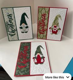 three christmas cards with the words merry and two gnomes on them, one for each card