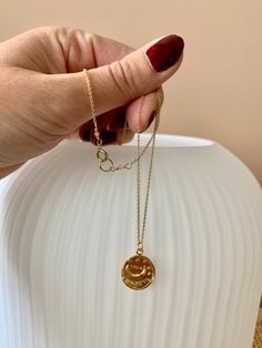 "Gold Disc Necklace, 14K Gold Filled Chain Necklace, Moon Disc Necklace, Greek Coin Necklace, Dainty Necklace, Gift for Her, Layering Necklace A delicate gold filled chain necklace with a gold vermeil greek coin charm. This necklace looks great on its own or is perfect to layer with other necklaces. The chain is a very delicate gold filled chain and closes with a gold filled spring clasp. Elegant and classic piece of jewelry to be worn everyday. D e t a i l s: => Metal - 14k gold filled chain Gold Necklace With Moon Charm In 14k Gold Filled, 14k Gold Filled Necklace With Moon Charm, Gold Coin Necklace With Moon Charm For Gift, Gold Plated Moon Shaped Charm Necklace, Gold Moon Charm Necklace With Delicate Chain, Symbolic Round Gold-plated Coin Necklace, Gold Engraved Moon Necklace, Gold Moon Necklace Tarnish Resistant, Gold Moon Necklaces Tarnish Resistant