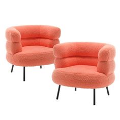 two orange chairs sitting next to each other