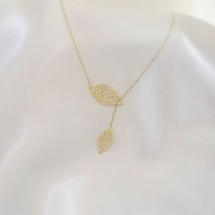 "\"Double Leaf Gold Necklace | Mother of Nature, Leaves of Tree Golden Pendant | Outline Hollow Leaves | Elegant Design | Gift for Her\" Perfect gift for your girlfriend, feyonce, wife, mother, daughter and for you best friend It can be gifted in anniversary, birthday, graduation, baby shower, and similar occasions. * Material: 14k Yellow Gold, 14k Rose Gold, 14k White Gold * Leaf Size (On Top): 0,87\" x 0,43\" // 22mm x 11mm (±5%) * Necklace Length: 14\" - 20\" // 35,6cm - 50,8cm (Please contac Yellow Gold Leaf Shape Nature-inspired Jewelry, Handmade 14k Yellow Gold-filled Necklaces, Leaf-shaped Yellow Gold Plated Jewelry, Yellow Gold Plated Leaf-shaped Jewelry, Yellow Gold Leaf-shaped Jewelry For Anniversary, Yellow Gold Leaf-shaped Anniversary Jewelry, Yellow Gold Leaf-shaped Formal Jewelry, Anniversary Yellow Gold Leaf Jewelry, Formal Yellow Gold Leaf-shaped Jewelry