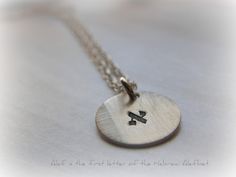 "Hebrew Alef - Taf Necklace - handstamped handmade by SimaG - Shalom Peace Ahava Love Chai Life your choice of word on 1/2\" disc The price is for one  {1} disc +chain _{1} birthstone   written as א  spelled as אָלֶף  transcribed as Aleph  pronunciation: ah-lef  numerical value: 1   Alef is the first letter of the Hebrew Alefbet  Small sterling silver 1/2\" disc on sterling silver delicate chain 16\" only   Contact me if you wish to wear your Hebrew letter.  made with LOVE, Simag http://www.simag.etsy.com" Mezuzah Necklace, Pagan Pendants, Hebrew Letters, Gold Necklace Simple, Zodiac Necklace, Dainty Gold Necklace, Minimalist Gifts, Necklace Simple, Necklace Minimalist