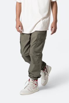 Vintage Cargo Pants - Camo | mnml | shop now Combat Style Cotton Bottoms With Pockets, Combat Cotton Cargo Pants, Baggy Combat Cotton Cargo Pants, Baggy Cotton Combat Cargo Pants, Combat Cotton Parachute Pants With Multiple Pockets, Combat Cotton Trousers, Combat Style Cotton Trousers, Cotton Cargo Combat Bottoms, Cotton Combat Cargo Bottoms