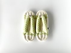 Relaxation from Japan: Feel the Warmth of Handmade, Casual Slippers for Indoor Enjoymen Size：FOOT Length 9.6in (24.5cm), Width 3.9in (10cm) US 7.5 EU 39 Nuno Zoris, a type of traditional Japanese indoor slipper.Unlike shoes, Nuno Zoris are okay even if they're not a perfect fit size-wise. It's fine if the base is slightly larger or smaller than your foot!In Japan, it's said to be stylish to wear these slightly smaller. Materials：It' made of 100% cotton fabric.The support core is made of polyester rope. The color:The main color is ivory, combined with bright green. The pattern of the nose-strap of Nuno Zoris is Japanese traditional pattern.Nuno Zoris are indoor footwear. By separating indoor and outdoor footwear, you can maintain a clean and comfortable living environment. Nuno Zoris gently Summer Indoor Closed Toe Slippers, Indoor Closed Toe Slippers For Summer, Closed Toe Indoor Slippers, Handmade Green Sandals For Spring, Traditional Green Open Toe Sandals, Traditional Handmade Slippers For Spring, Traditional Open Toe Slippers For Spring, Traditional Round Toe Slippers For Spring, Handmade Open Toe Slippers For Spring