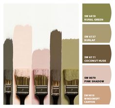 four paint brushes with different shades of green, pink, and brown on them in the same color scheme