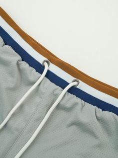 Inspired by the nostalgic era of the 90s, we designed this short to fit right above your knee.The Grey Scale Active Short is made with 4 technical multi-stretch fabrics. Deep pockets on the side. Ribbed waistband with an adjustable drawstring. Inner lining that wicks away moisture and provides ultimate comfort. Above the knee fit Made with 4 multi-stretch fabric (contains spandex) Ribbed Waistband Embroidered Kinetic branding Model 6'0 160lbs wearing a Medium Sporty Outdoor Shorts With Drawstring, Sporty Drawstring Athletic Shorts For Outdoor, Sporty Drawstring Shorts For Outdoor, Outdoor Athletic Shorts With Drawstring, Sportswear Nylon Shorts With Functional Drawstring, Nylon Sportswear Shorts With Functional Drawstring, Drawstring Athletic Shorts For Outdoor, Sporty Drawstring Shorts For Streetwear, Sportswear Nylon Shorts With Drawstring