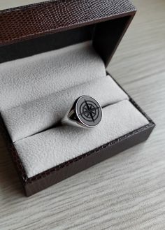 Onyx Compass Signet Ring that can be personalized with your desired Family Crest design. A handmade piece that has been brought to life with the combination of fine goldsmith techniques and the latest technology. 📩 Leave us a message with your custom personalization, your family crest, coat of arms, logo or any design imagined. If you would like a different gemstone instead, please contact us. Gemstone Signet Ring - Compass Ring - Intaglio Ring - Wax Seal Ring - Traveler Ring - Danelian Jewelry Black Symbolic Hallmarked Signet Ring, Silver Signet Ring With Intaglio As Gift, Black Etched Rings For Formal Occasions, Formal Black Etched Rings, Gift Signet Ring With Compass Design, Round Intaglio Signet Ring Gift, Intaglio Signet Ring As A Gift, Black Compass Design Jewelry Gift, Intaglio Signet Ring Gift