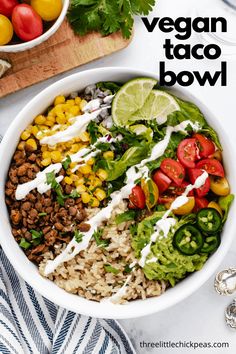 a white bowl filled with rice and vegetables