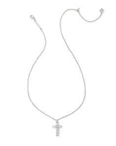 A meaningful symbol gets a touch of glam in the Gracie Silver Cross Short Pendant Necklace in White Crystal. Princess cut crystals are arranged in a sparkling cross shape and paired with a dainty chain. Sweet and full of shine, add this pendant to your everyday style rotation as a reminder of what matters to you most. Metal Rhodium Over Brass Material White Crystal Closure Lobster Clasp W/ Single Adjustable Slider Bead Size 19" Chain, 0.52"L X 0.88"W PendantDue to the one-of-a-kind nature of the Kendra Scott Silver Jewelry, Crystal Princess, Athleisure Accessories, Short Pendant Necklace, Ninth Grade, Cross Shape, Cross Necklaces, Wishlist 2024, Pandora Necklace