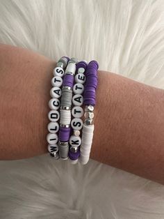 GO WILDCATS!! Kansas State University--Need Cute swag to cheer on your favorite team?! Look no further!!  Set comes with 4 beautiful bead Bracelets. Bracelets are handmade and are 7 inches in length, this fits most wrists. Please let me know if you'd like to create a custom custom bracelet for you! Kansas State University, Bracelet Diy, Purple Party, Kansas State, State University, Custom Bracelets, Bracelet Stack, Clay Beads