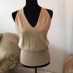 Brand New Gold Sleeveless Top V- Neck Tanktop Great Condition Chic Gold Stretch Tank Top, Fitted Gold Tank Top, Chic Gold Sleeveless Top, Elegant Gold Tank Top, Sleeveless Knit Top For Night Out, Chic Gold Sleeveless Halter Top, Casual Gold Sleeveless Tank Top, Gold Sleeveless Casual Top, Casual Gold Sleeveless Top