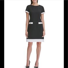 Tommy Hilfiger Women's Dress. Our Short-Sleeve Dress Is Designed In An A-Line Shape For An Easy To Wear (And Flattering) Look. Contrast Trim And Front Pockets Give It A Mod Vibe That Goes From The Office To Dinner Without Missing A Beat. A-Line Fit. 94% Polyester, 6% Elastane. Zip Closure At Back. Tommy Hilfiger Dress For Summer Workwear, Tommy Hilfiger Summer Dress For Workwear, Chic Tommy Hilfiger Dresses For Work, Casual A-line Dress By Tommy Hilfiger, Elegant Tommy Hilfiger Dresses For Workwear, White Tommy Hilfiger Dress For Work, Tommy Hilfiger White Dress For Work, Chic Tommy Hilfiger Mini Dress For Work, Tommy Hilfiger Knee-length Workwear Dress