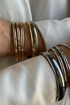 Bangle up with the Nadia Bangle. So sleek and eternally chic, this gold bangle elevates any wrist stack. Pair with other bangles to make a statement. Name Friendship Bracelets, Stacking Bangles, Wrist Stack, Wrist Stacks, Ups Shipping, Stacked Bangles, Gold Bangle, Bead Bracelets, Gold Bangles