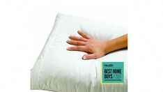 a person's hand on top of a pillow with the words best home buys 2009