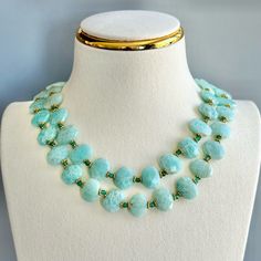 This Double Layered Necklace Features Real Turquoise Faceted Stones With 18kt Gold Plated Details. Pair With A White T-Shirt Or Fancy Dress. Chain 17"L (8.5"L When Clasped) New Condition, Never Worn Elegant Double Strand Turquoise Necklace, Elegant Double Strand Blue Turquoise Necklace, Turquoise Round Beads Emerald Necklace, Elegant Round Amazonite Necklace, Double Strand Necklace, Real Turquoise, Strand Necklace, Fancy Dress, Blue Gold