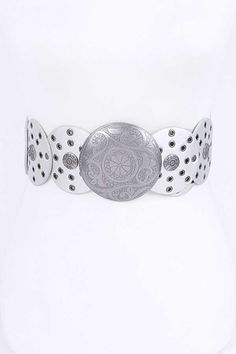 elevate your style with the faux leather rivet studded belt. this stunning belt features an engraved buckle and faux leather material, accented with rivet studs for an edgy touch. with a width of 3" and a length of 40.5", it's perfect for adding a bold statement to any outfit. available in black, caramel, and silver. details & measurements width 3" length 40.5" polyurethane, iron, lead & nickel compliant Trendy Silver Belt Buckle With Belt Included, Adjustable Festival Belts With Rivets, Adjustable Silver Bohemian Belt, Bohemian Silver Adjustable Belt, Adjustable Silver Belt For Festival, Adjustable Silver Belt, Silver Bohemian Adjustable Belt Buckles, Leather Rivets, Studded Belt