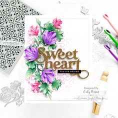 a card with flowers and the words sweet heart you are surrounded by crafting supplies