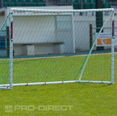 a soccer goal in the middle of a field