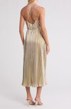 Make an elegant appearance in this metallic plissé midi dress tethered by slim criss-cross straps. Slips on over head V-neck Adjustable straps Lined 95% polyester, 5% spandex Hand wash, dry flat Imported Pleated Midi Dress With Spaghetti Straps For Date Night, Elegant Gold Midi Dress With Spaghetti Straps, Gold Spaghetti Strap Midi Dress, Glamorous Pleated Midi Summer Dress, Glamorous Pleated Midi Dress, Gold Midi Dress For Spring Evening, Metallic Midi Dress For Spring Evening, Elegant Metallic Pleated Dress, Chic Metallic Pleated Dress