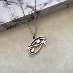 Eye of Horus Necklace Egyptian Necklace Eye of Ra Necklace - Etsy Cyprus Silver Charm Necklace In Alloy, Spiritual Stainless Steel Pendant Charm Necklace, Symbolic Tarnish Resistant Stainless Steel Necklaces, Symbolic Stainless Steel Pendant Jewelry, Stainless Steel Pendant Charm Necklaces As Gift, Symbolic Tarnish Resistant Stainless Steel Necklace, Symbolic Stainless Steel Tarnish Resistant Necklace, Personalized Silver Brass Necklaces, Silver Spiritual Charm Necklaces In Stainless Steel