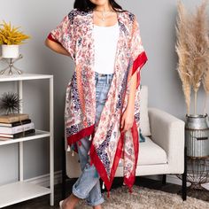 "Get ready to make a statement with our Alina Paisley Floral Patchwork Kimono! Perfect for any occasion, this kimono features vibrant paisley and floral prints, creating a unique and eye-catching look. With its lightweight and flowy design, it's the perfect addition to your wardrobe. Perfect for both beaches and festivals! 100% Viscose One Size Fits Most 0-14 Length: 38\" Bust: 36\"" Casual Spring Paisley Print Kimono, Spring Paisley Print Open Front Kimono, Spring Kimono With Paisley Print And Kimono Sleeves, Spring Open Front Paisley Print Kimono, Patchwork Kimono, Flowy Design, Floral Patchwork, Spring Prints, Lace Splicing