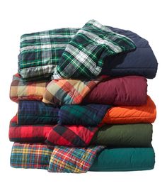 a pile of blankets sitting on top of each other