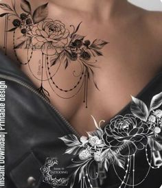 a woman's chest with flowers on it and the words, tattoo designs for women