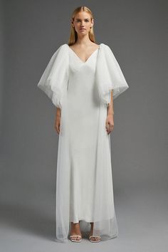 Style: CapeDesign: PlainFabric: MeshSleeve Length: 3/4 Sleeve Bridal Cape Sleeves, Tule Cape, Bridal Slip Dress, Bridal Dresses Vintage, Coast Fashion, Layered Sleeves, Tulle Cape, Cape Fashion, Cape Coast