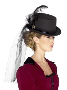 The steampunk style inspires this Victorian top hat which comes with veil  broach  and feathers detailing. Accessorize this with your favorite costume to give a finishing touch. Make a fashion statement and get noticed at the Victorian-themed or Halloween parties.    

Product Features:  
Features ladies Victorian top hat with veil  feathers and brooch  
Perfect for Halloween themed party; dyes may not be colorfast  
Adult size costume; not for children  
Costume comes in display card  
Warning: Steampunk Fancy Dress, Fancy Dress Womens, Steampunk Mode, Top Hats For Women, Fancy Dress Ideas, Victorian Top, Moda Steampunk, Headband Veil, Ladies Fancy Dress