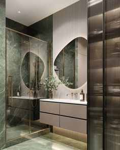 a modern bathroom with marble walls and flooring