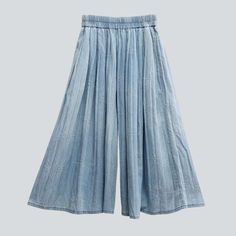 Take a step back to the '00s with our Y2K-inspired 2023 Spring-Summer Collection Light Wash Culottes Denim Pants. With vintage-trend embroidery. a elevated-waist fit. and a rubber closure. these pants are the epitome of effortlessly chic fashion. Distinctive Features: Y2K Style: Channel the nostalgia of the early 2000s with a style that is timeless and unique. Embroidered: Take your look to the next level with intricate embroidery that adds a vintage touch. Culottes: Show off your legs with a pa Trendy Stretch Wide-leg Jeans, Blue Cotton Wide-leg Jeans, Spring Wide Leg Dark Wash Cropped Jeans, Spring Dark Wash Washed Flare Jeans, Dark Wash Wide-leg Cropped Jeans, Spring Vintage Flare Jeans With Frayed Hem, Vintage Flare Jeans With Frayed Hem For Spring, Casual Wide Leg Cropped Pants With Frayed Hem, Casual Summer Jeans With Elastic Waistband