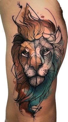 a tattoo with a lion on it's side