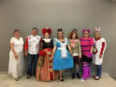 a group of people dressed up in costumes