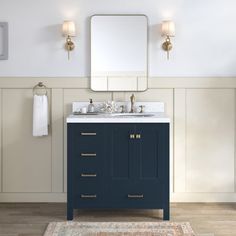 a bathroom with a sink, mirror and rug on the floor in front of it