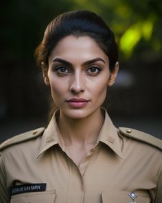 a woman in uniform posing for the camera