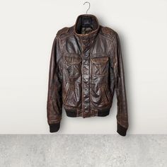 When it comes to leather jackets, the options are endless. From classic brown leather jackets to trendy styles, these garments are perfect for creating stylish outfits, especially during the winter season. Men can also rock a leather jacket with confidence, adding a touch of rugged elegance to their ensemble. Rugged Leather Jacket For Winter Streetwear, Brown Casual Leather Jacket With Padded Collar, Casual Brown Leather Jacket With Padded Collar, Rugged Leather Jacket For Fall Streetwear, Vintage Brown Outerwear For Winter Streetwear, Vintage Brown Leather Jacket With Pockets For Winter, Vintage Leather Jacket For Winter Streetwear, Vintage Brown Leather Jacket For Streetwear, Rugged Vintage Brown Leather Jacket For Winter