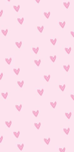 pink hearts are arranged on a light pink background for valentine's day wallpaper