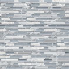 a gray and white mosaic tile wallpaper with grey stripes on the bottom half of it