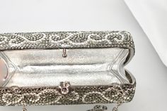 "We just love this small tube shape! Elegant! Fits in your hand! Just the Right Accent! These Formal Evening Purses in Blushing Pink , Silver Grey Scroll and Jet Black will get people talking! Each is handmade. Each takes a month to complete, one crystal at a time! Here at Etsy, we offer you the best quality at discounted prices, a fraction of what high priced retailers charge! These are evening bags that are fully covered in genuine, very fine, small sized Swarovski Crystals from Austria! One p Elegant Bling Evening Bag, Designer Rhinestone Evening Bag For Formal Occasions, Designer Evening Bag With Rhinestones For Formal Occasions, Luxury Formal Clutch With Bling, Elegant Evening Bag With Bling For Formal Events, Elegant Evening Bag With Bling For Formal Occasions, Luxury Sparkling Clutch For Events, Luxury Bling Clutch For Formal Events, Luxury Bling Clutch For Formal Occasions