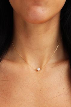 A simple, classic single 6mm pearl graces a dainty, diamond cut minimalistic chain.  Perfect for anyone and everyday!- 14K Gold Filled Chain or Sterling Silver- Swarovski crystalline pearl- Choose length from drop down- Comes perfectly packaged for gift giving! Simple Everyday Jewelry With Pearl Charm, Simple Pearl Chain Necklace, Elegant Everyday Charm Necklace With Simple Design, Simple White Pearl Chain Jewelry, Simple White Pearl Necklace For Everyday, Minimalist Pearl White Necklace With Delicate Chain, Minimalist White Pearl Necklace For Everyday Wear, Minimalist White Pearl Necklace For Everyday, Minimalist Everyday White Pearl Necklace