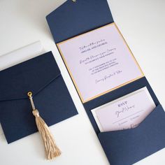 a blue and white wedding suite with a gold tassel