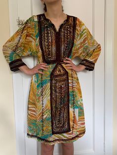 Old Vintage Balochi Tribal Dress. Made & Hand Stitched & Embroidered By Tribal Women in Afghanistan  100% Handmade Unique Embroidered Dress  It has a loose silhouette that falls in length to the knee. Perfect for Summer wear and going to festivals and any boho occasions Its has real ethnic vibes Semi sheer so you may need an undergarment  As this is a vintage dress so there are some light signs of wear . Size appropriately U.K. 10/12 If you want to wear it a bit looser then would be good for a U Balochi Dress, Hippie Dress, Dress Bohemian, Ethnic Dress, Hippie Dresses, Dresses Uk, Unique Dresses, Bohemian Dress, Vintage Dress