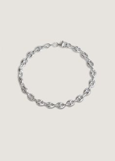 The mariner chain is a classic style that has stood the test of time. The hollow puffed links are seemingly inflated to create a lightweight style without compromising durability. Create a bold stack by mixing our first sterling silver bracelet with a yellow gold chain. 925 sterling silver. Average weight: 5.9g Width: 5mm Lobster clasp closure White Gold Chunky Chain Link Bracelet, White Gold Chunky Link Chain Bracelet, White Gold Link Chain Bracelet With Chunky Chain, Classic Sterling Silver Bracelet With Chunky Oval Links, Chain Bracelet Silver, Fall Rings, Silver Signet Ring, Gold Heart Necklace, Silver Chain Bracelet